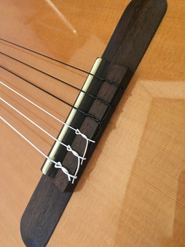 完成形、抜けやすい1弦から端を縛る形